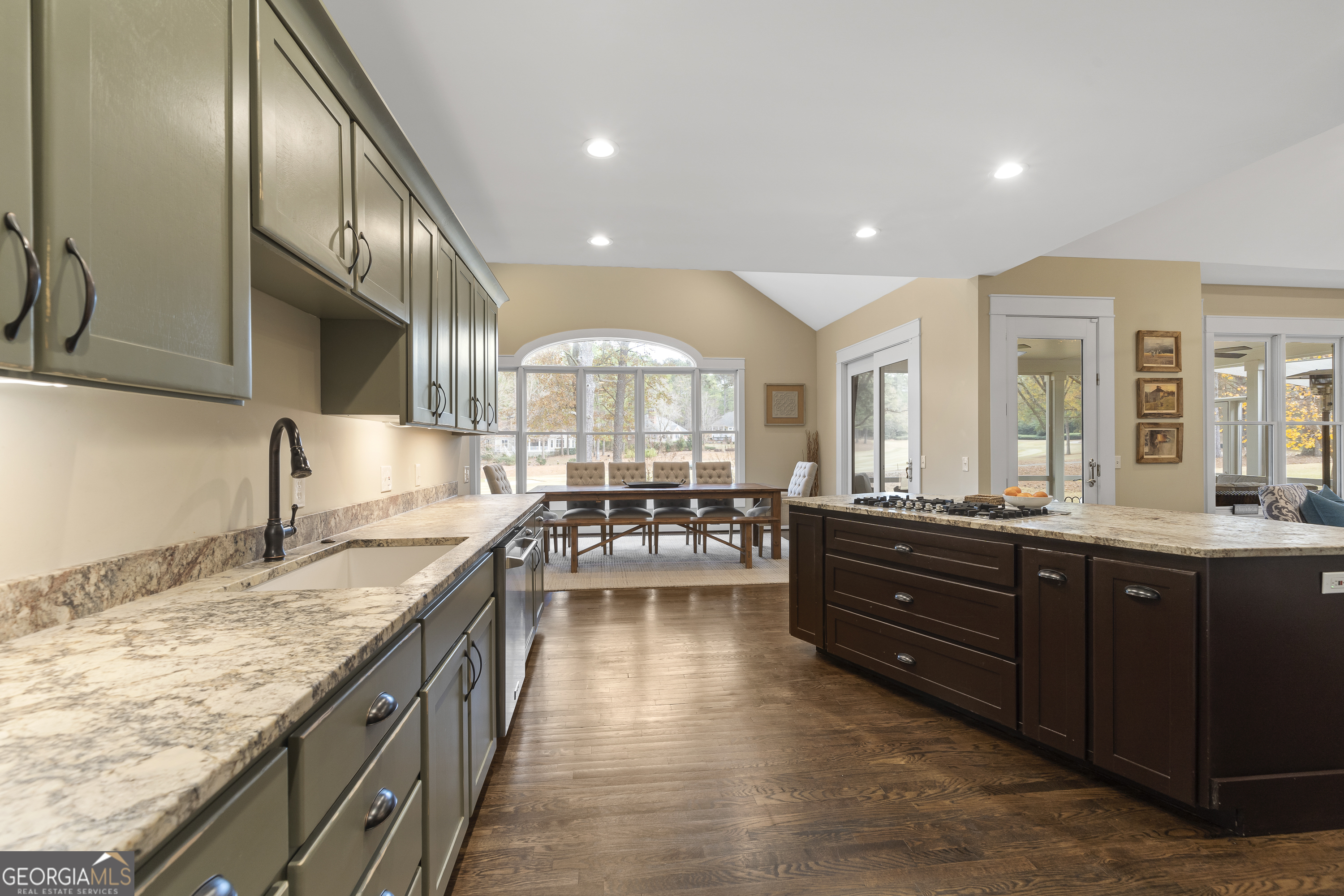 100 Camelrest Lane Eatonton, GA 31024 - Photo 11 of 59 a large kitchen with stainless steel appliances granite countertop plenty wooden cabinets
