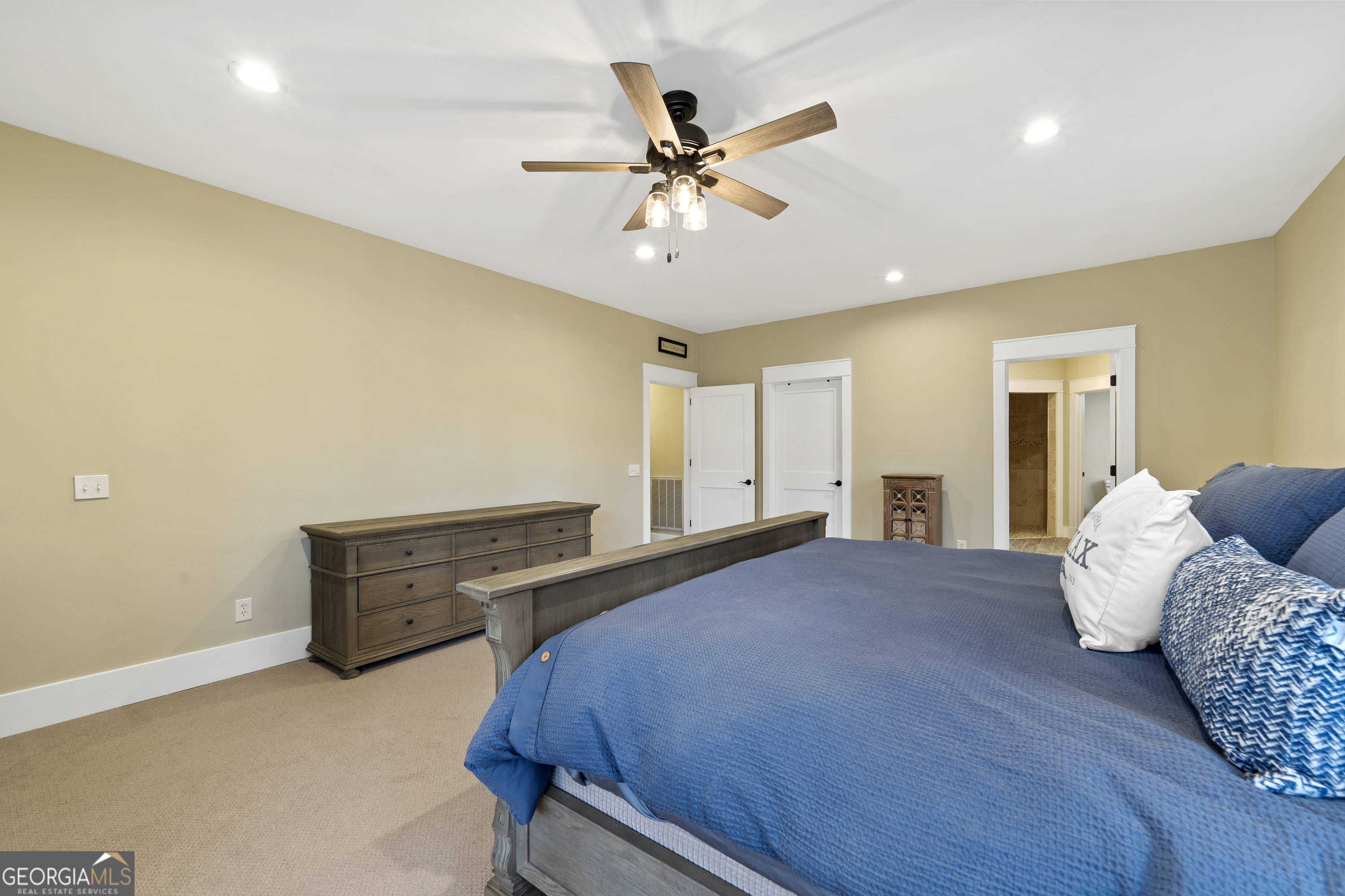 100 Camelrest Lane Eatonton, GA 31024 - Photo 22 of 59 a bedroom with a bed and ceiling fan