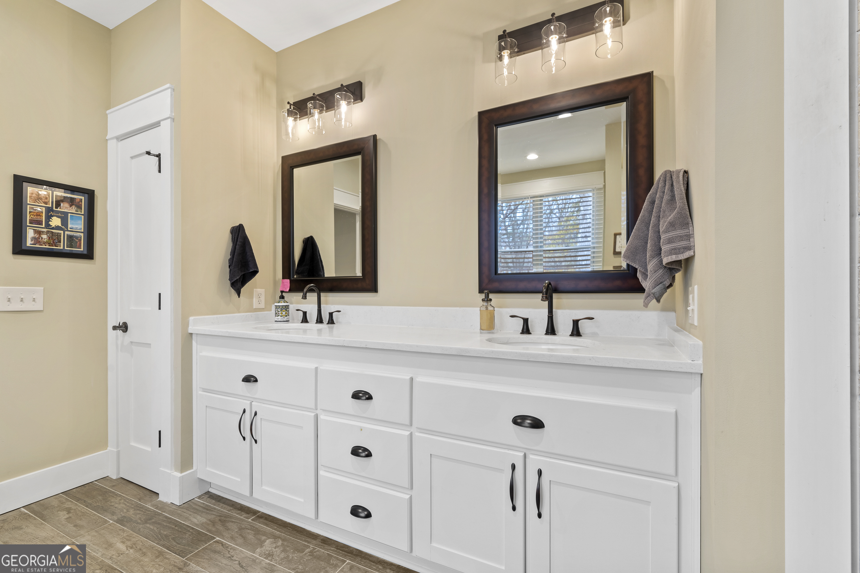 100 Camelrest Lane Eatonton, GA 31024 - Photo 26 of 59 a bathroom with double sink and two mirror