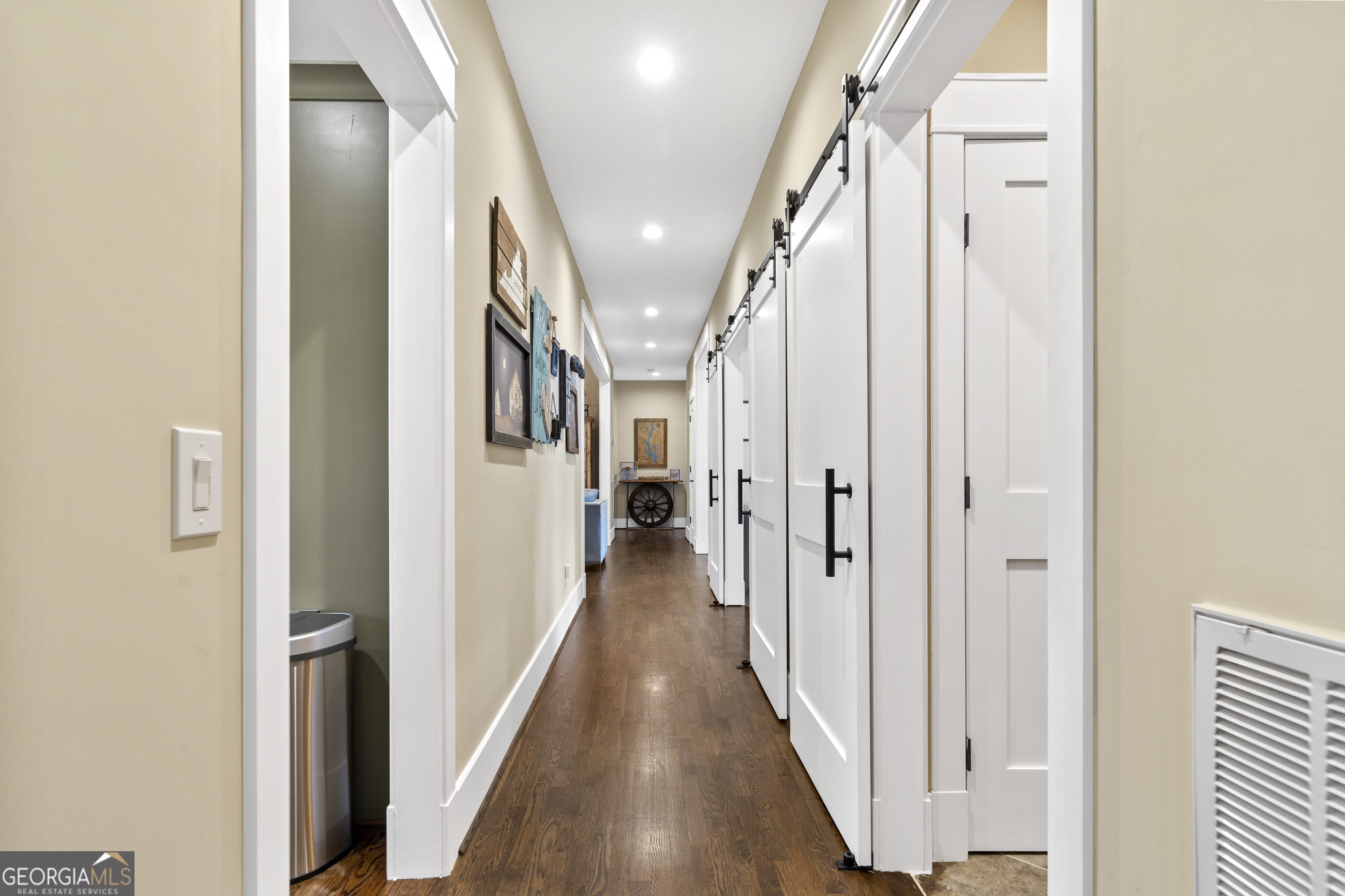 100 Camelrest Lane Eatonton, GA 31024 - Photo 27 of 59 a view of a hallway with wooden floor and staircase