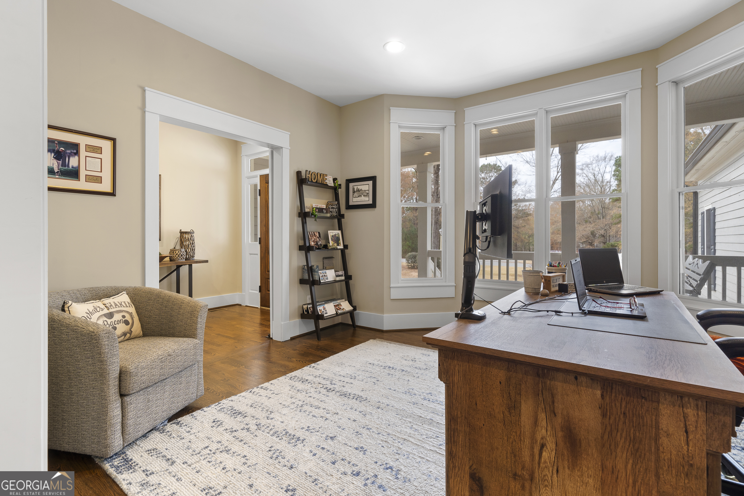 100 Camelrest Lane Eatonton, GA 31024 - Photo 29 of 59 a living room with furniture and large windows