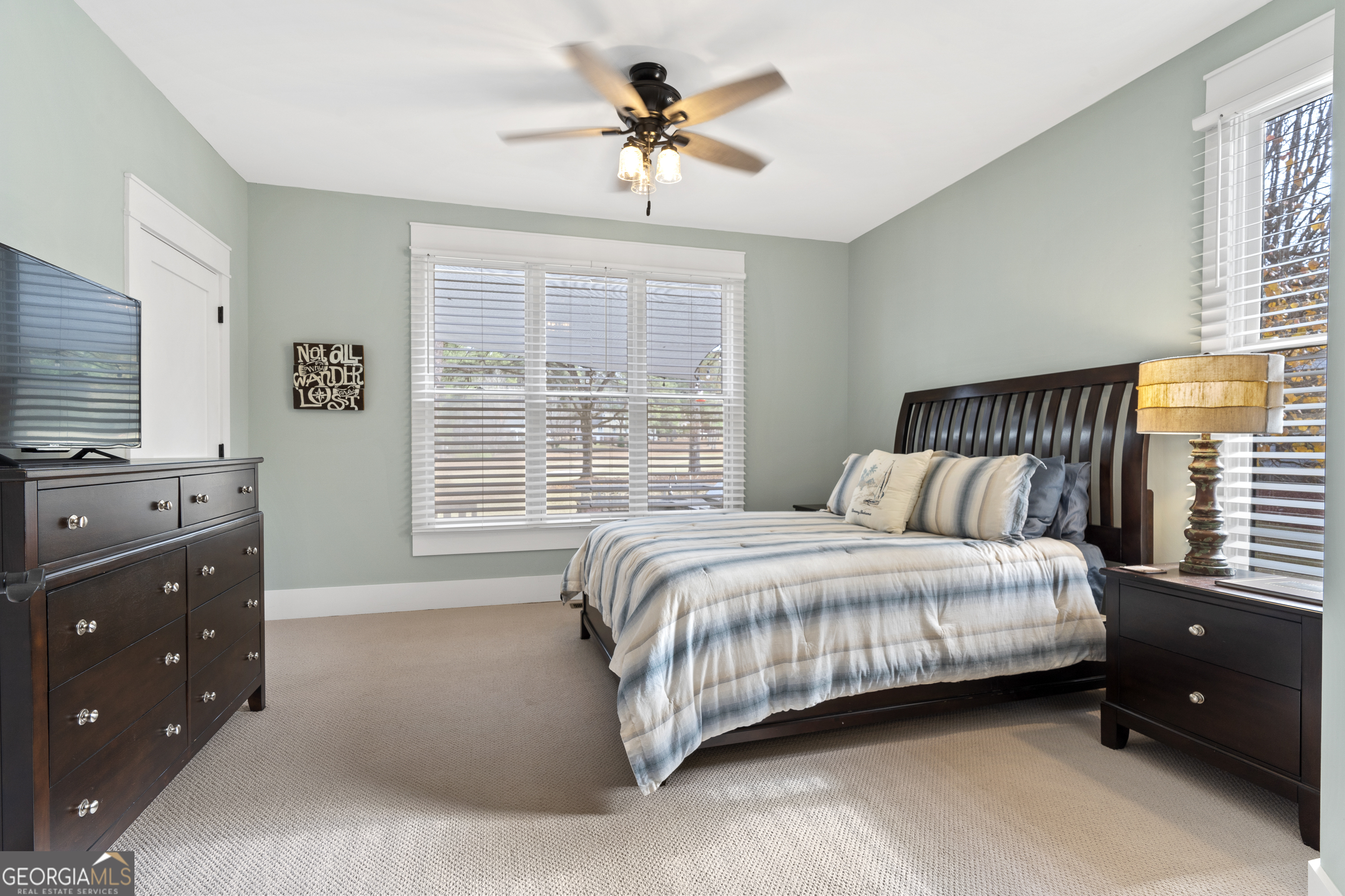 100 Camelrest Lane Eatonton, GA 31024 - Photo 35 of 59 a bedroom with a bed and window