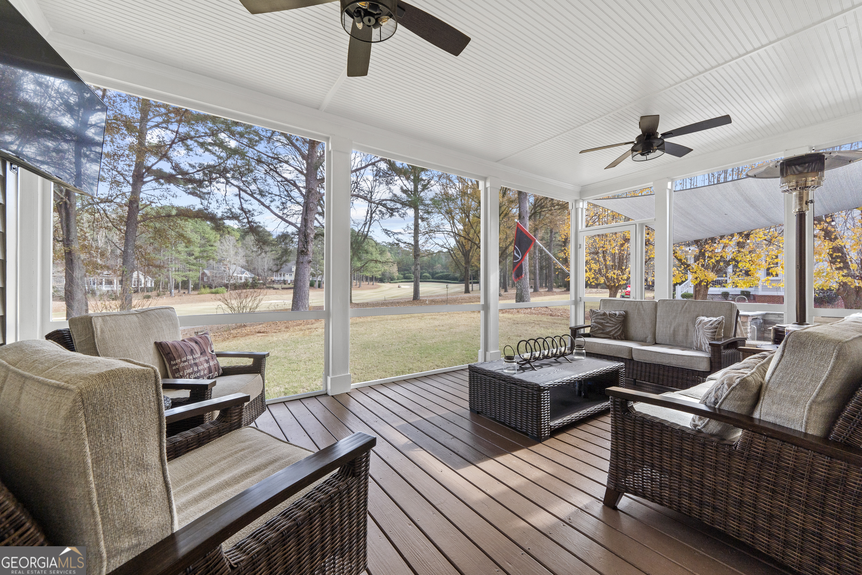 100 Camelrest Lane Eatonton, GA 31024 - Photo 40 of 59 a living room with furniture and a floor to ceiling window