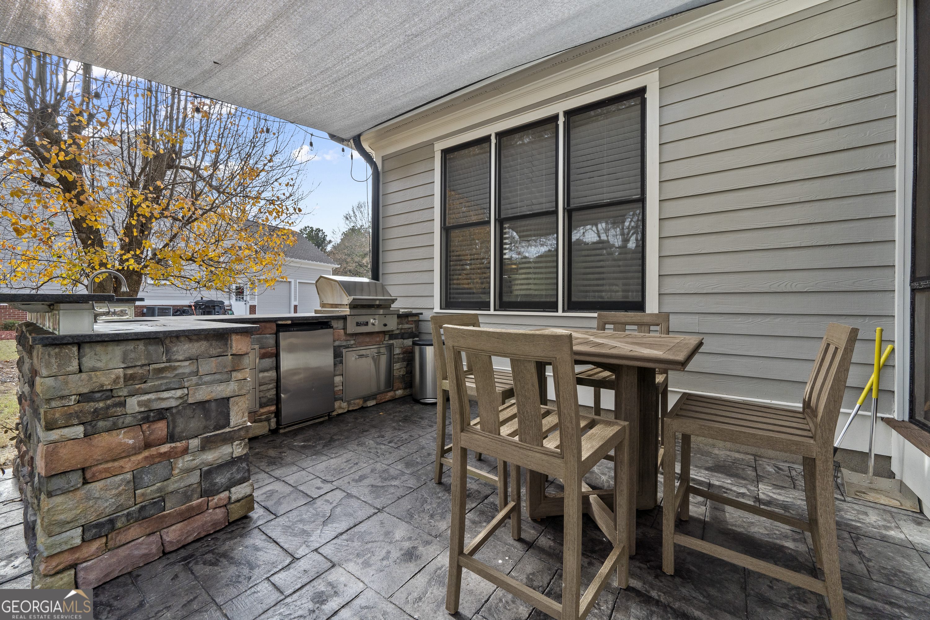 100 Camelrest Lane Eatonton, GA 31024 - Photo 42 of 59 a view of a chairs and table in the back