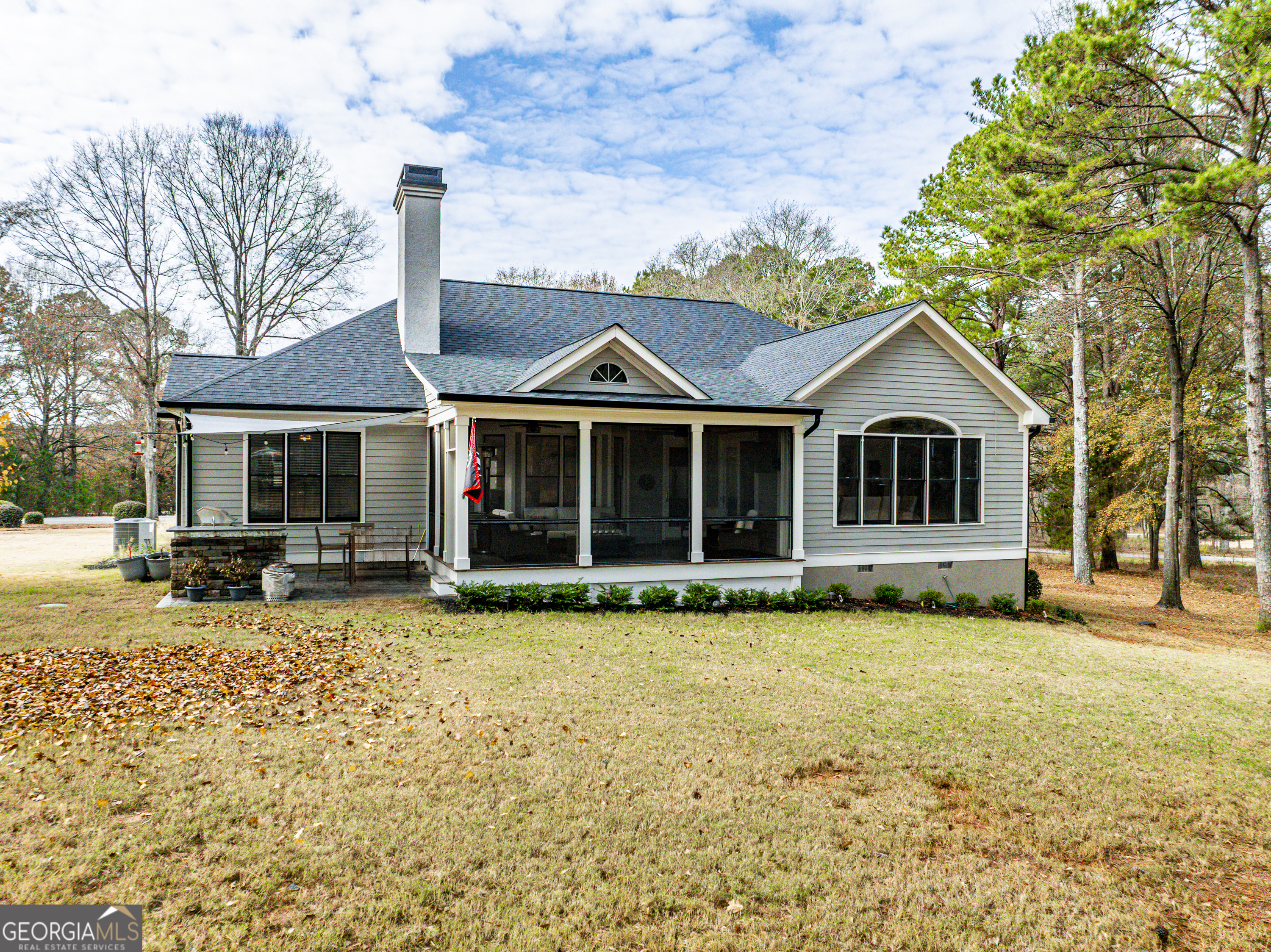 100 Camelrest Lane Eatonton, GA 31024 - Photo 44 of 59 a front view of a house with a garden