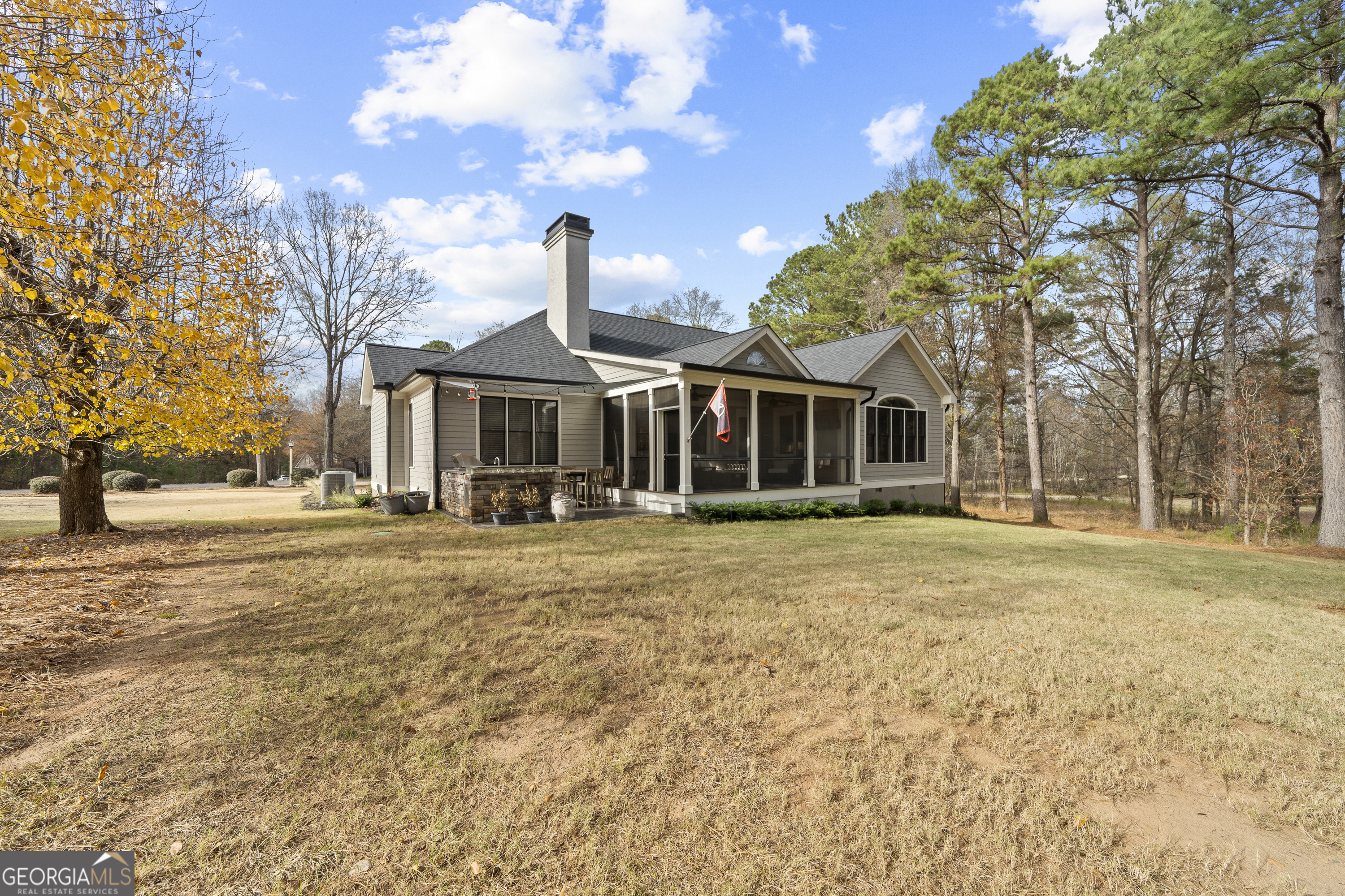 100 Camelrest Lane Eatonton, GA 31024 - Photo 46 of 59 a front view of a house with a garden