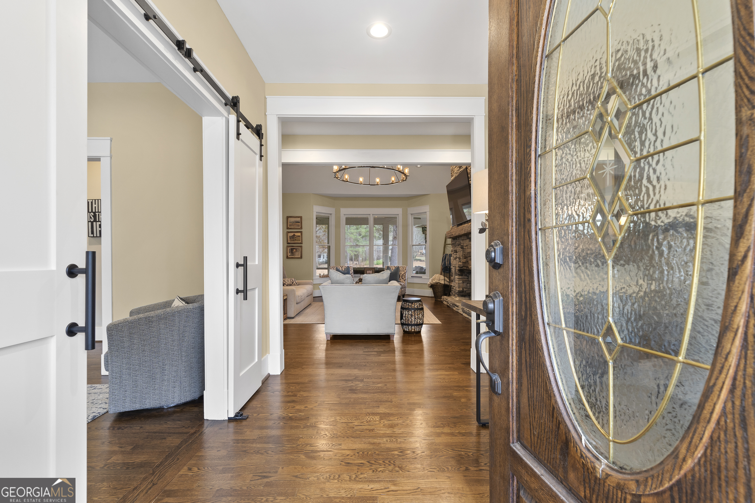 100 Camelrest Lane Eatonton, GA 31024 - Photo 5 of 59 a view of a hallway with furniture and floor to ceiling window