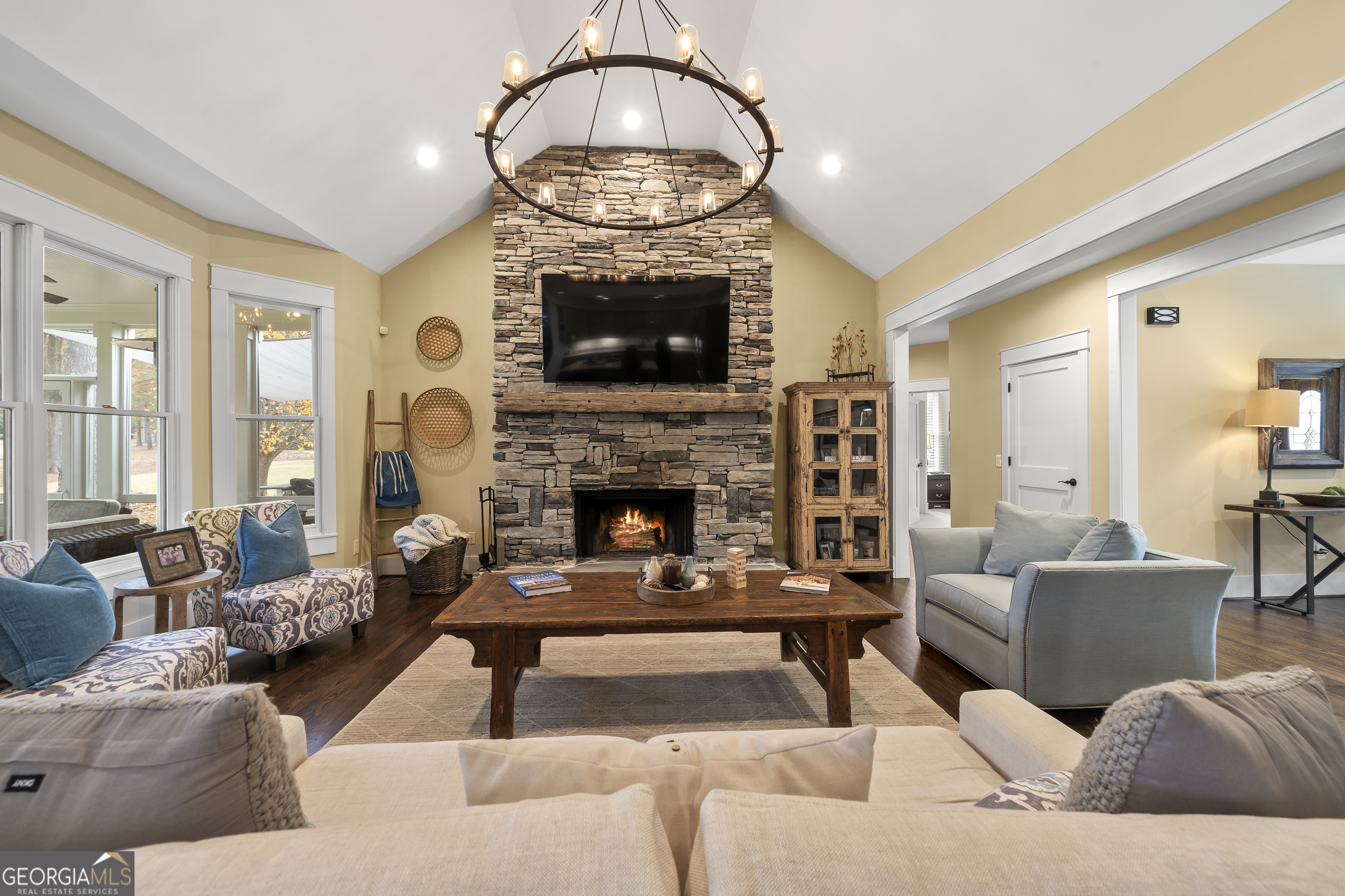 100 Camelrest Lane Eatonton, GA 31024 - Photo 8 of 59 a living room with furniture a fireplace and a flat screen tv