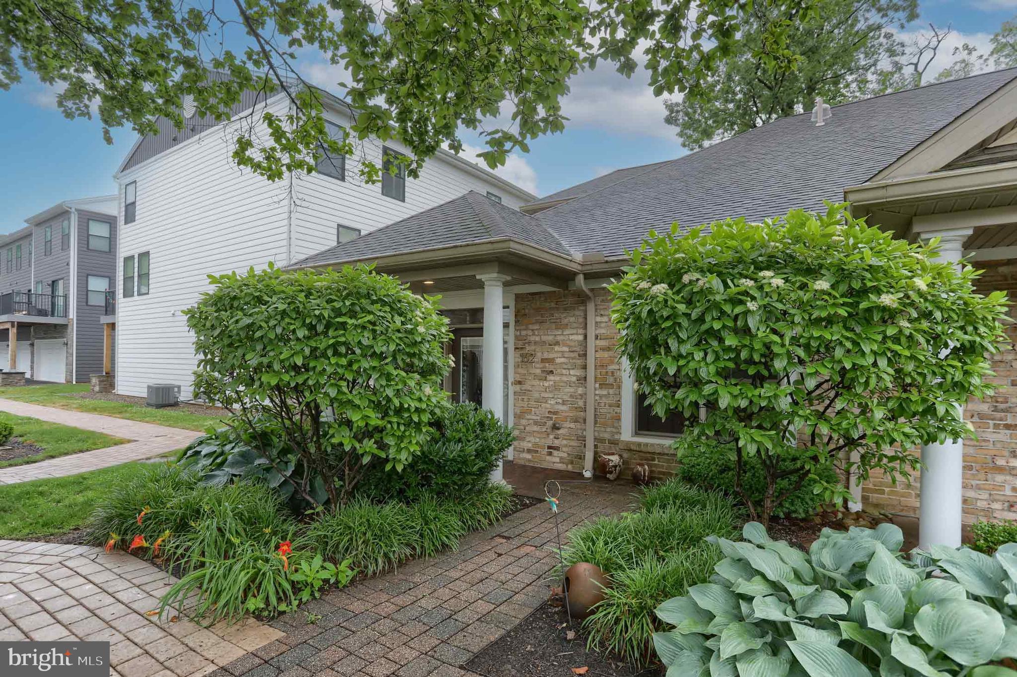 162 High Pointe Drive Hummelstown, PA 17036 - Photo 32 of 38 a front view of a house with garden