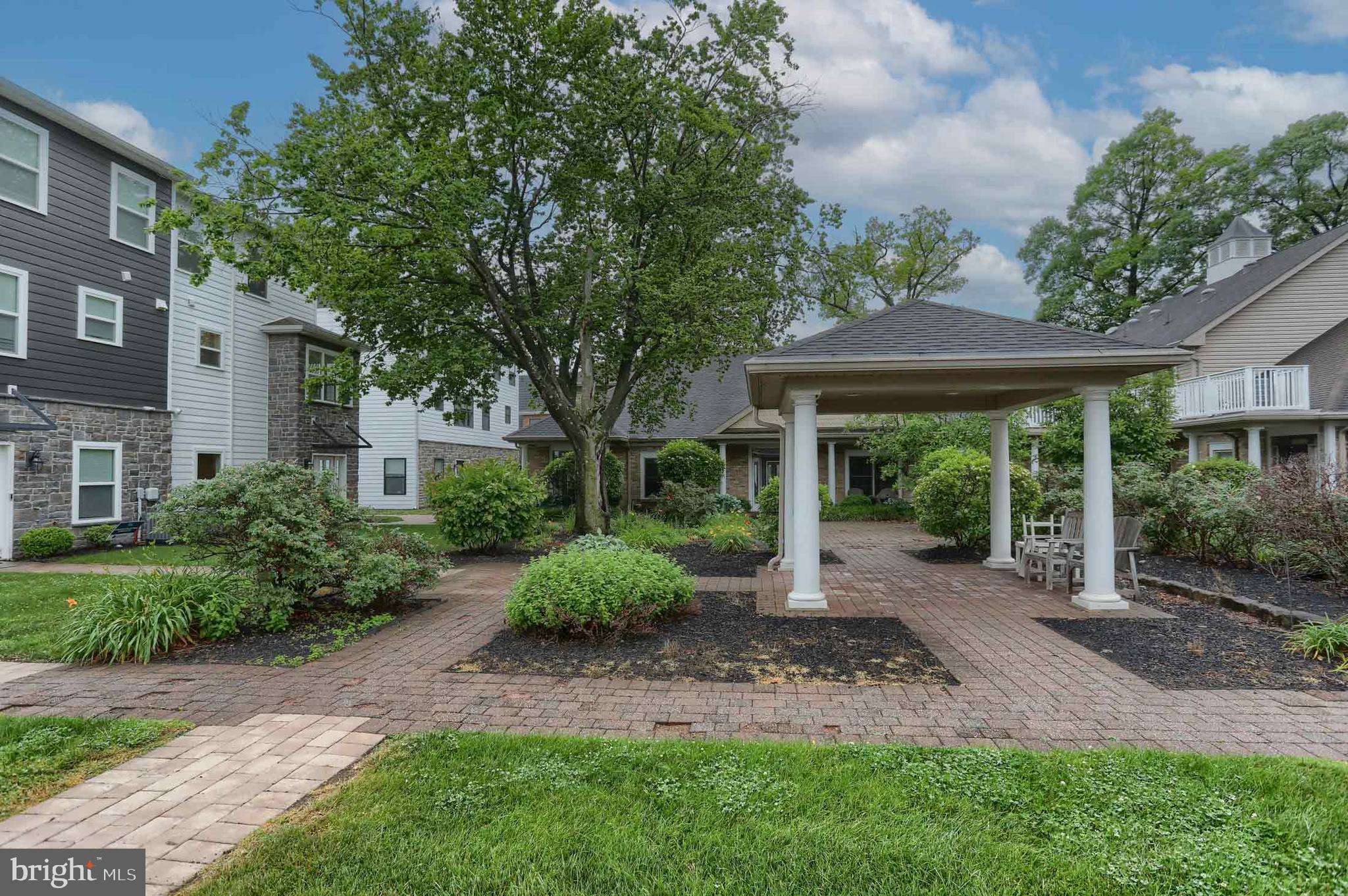 162 High Pointe Drive Hummelstown, PA 17036 - Photo 35 of 38 a front view of a house with garden