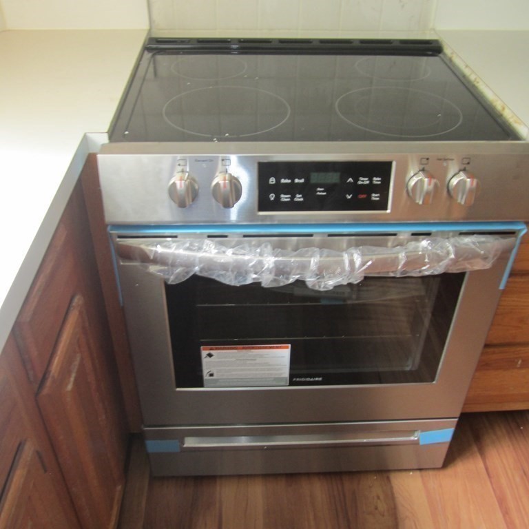 120 Fellsview Road, Unit 124 Stoneham, MA 02180 - Photo 12 of 20 a close view of stove