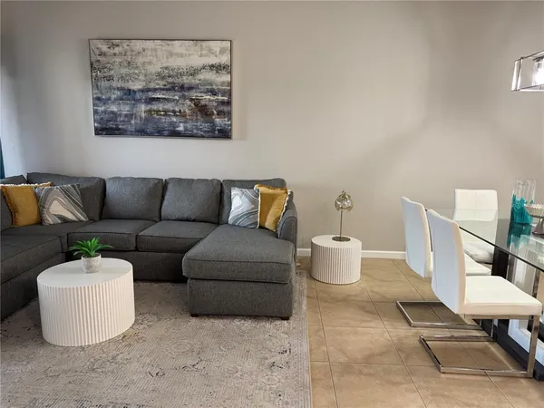 a living room with furniture and a couch