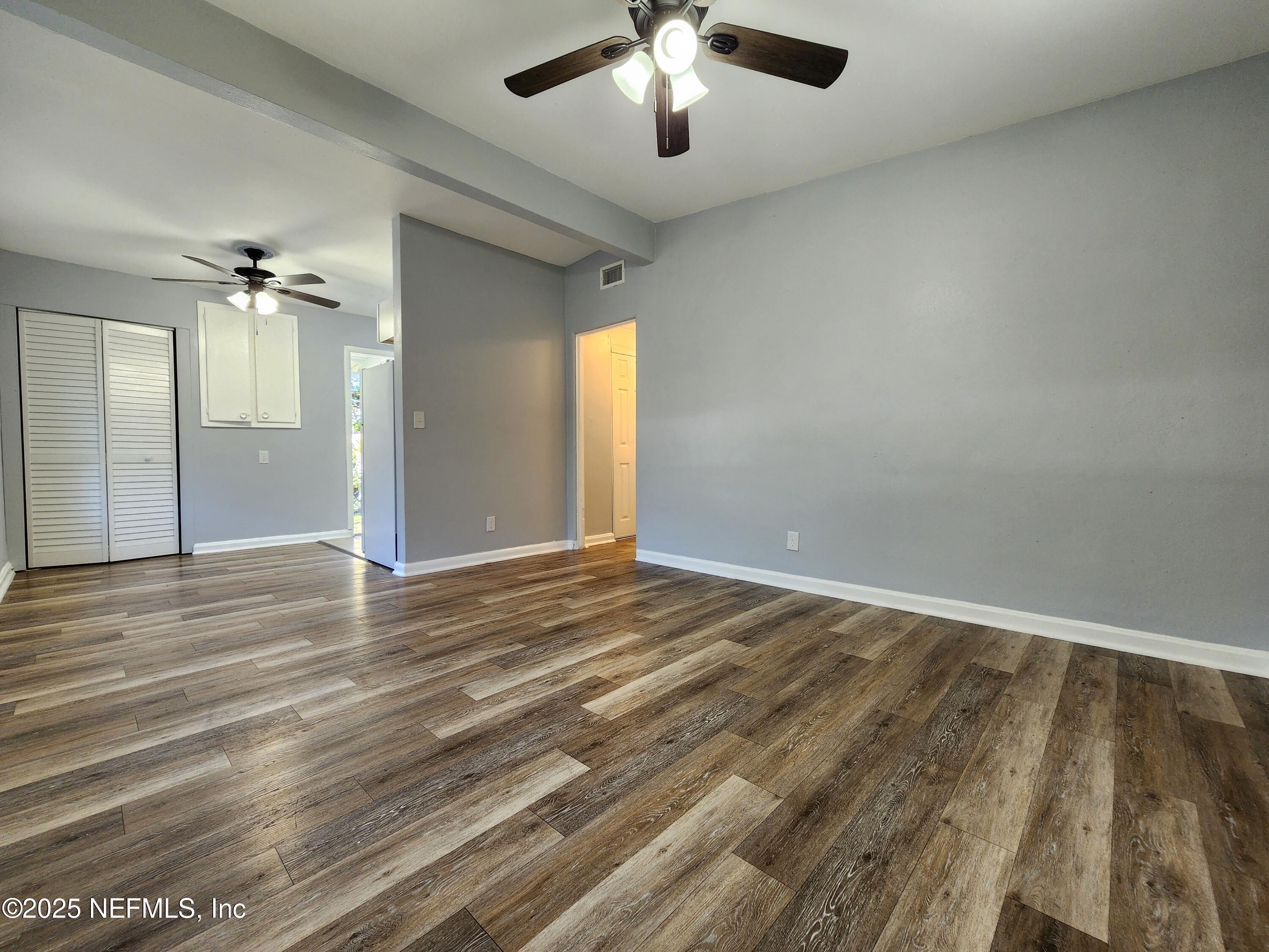 6151 Ardisia Road West Jacksonville, FL 32209 - Photo 5 of 18 wooden floor in an empty room