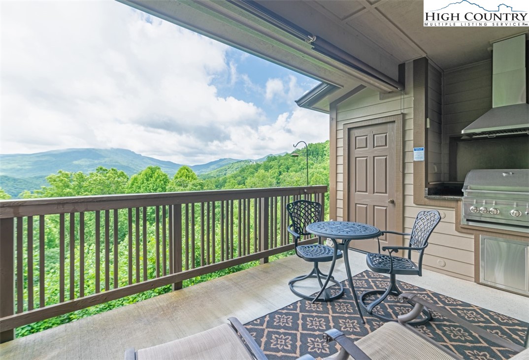 164 Evening View Lane, Unit CB2 Boone, NC 28607 - Photo 12 of 23 a view of a balcony with furniture