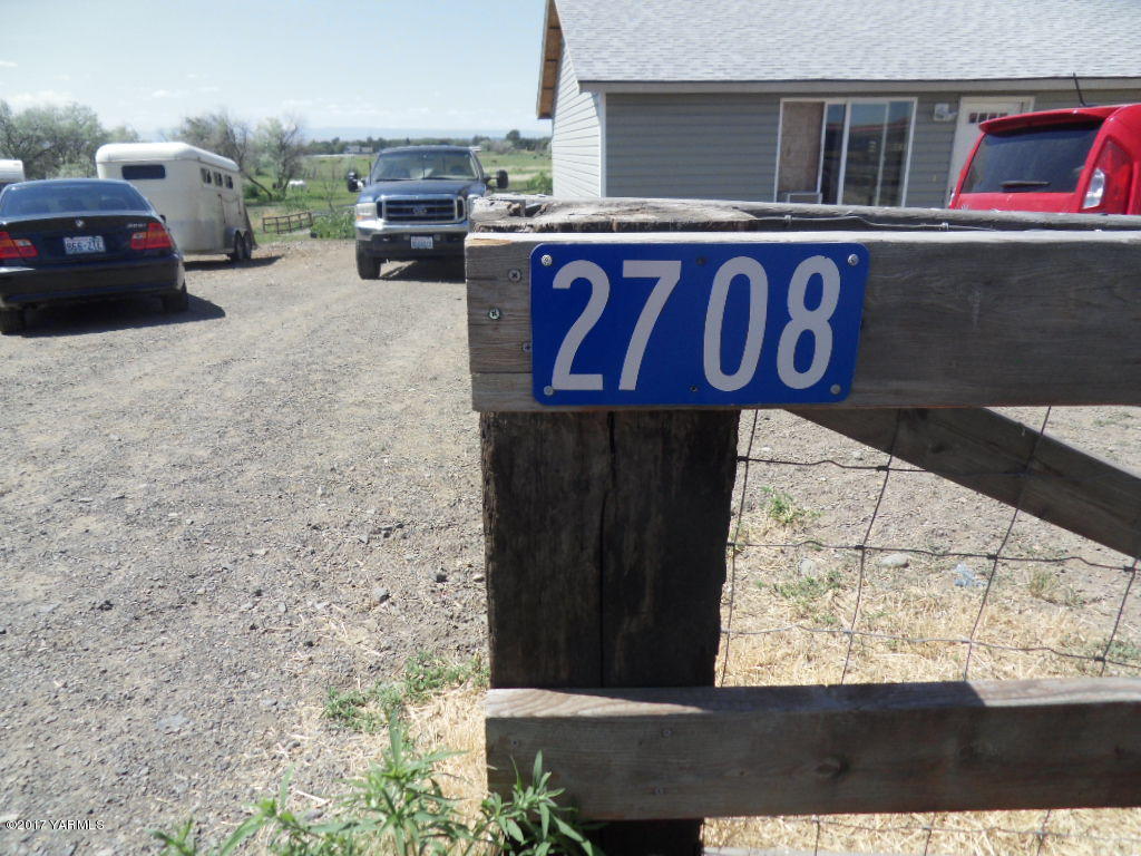 2708 Birchfield Road Yakima, WA 98901 - Photo 2 of 13 a view of a street sign on a brick wall