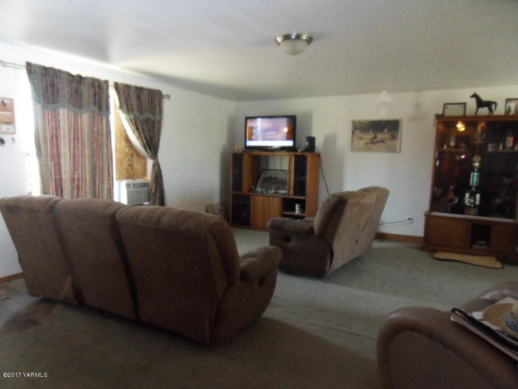 2708 Birchfield Road Yakima, WA 98901 - Photo 3 of 13 a living room with furniture and a window
