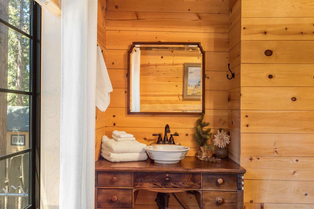 21868 Crestline Road Palomar Mountain, CA 92060 - Photo 14 of 26 a bathroom with a sink and a mirror