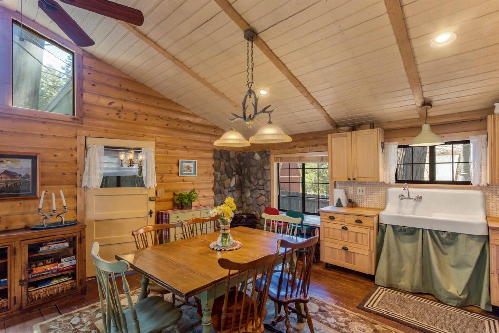 21868 Crestline Road Palomar Mountain, CA 92060 - Photo 9 of 26 a view of a dining room with furniture window and wooden floor