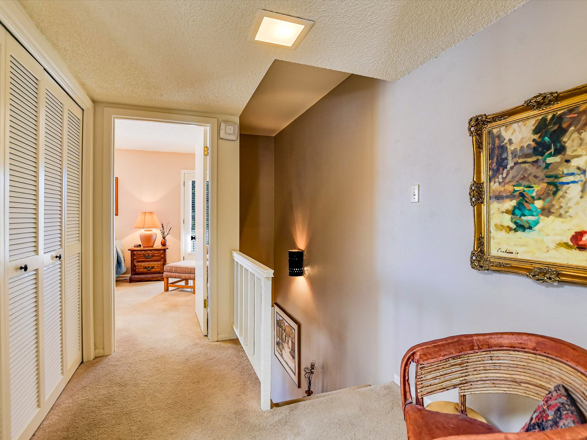 3500 Enfield Road, Unit E Austin, TX 78703 - Photo 11 of 20 a bedroom with a bed and a painting on the wall