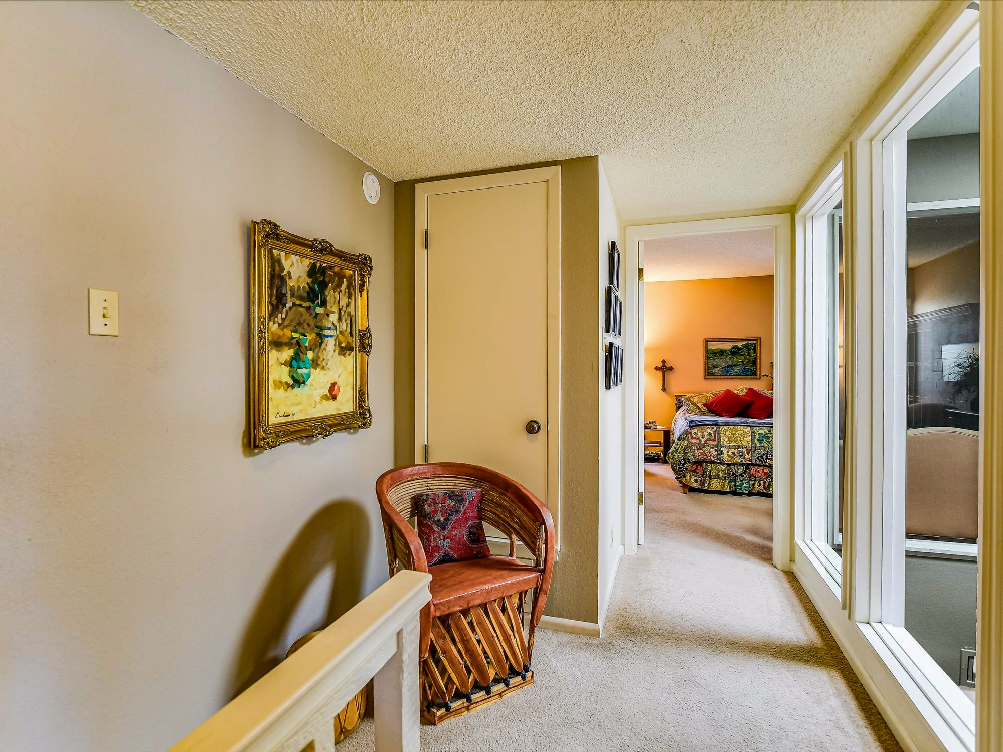 3500 Enfield Road, Unit E Austin, TX 78703 - Photo 12 of 20 a view of a hallway to a livingroom and a dinning area with furniture