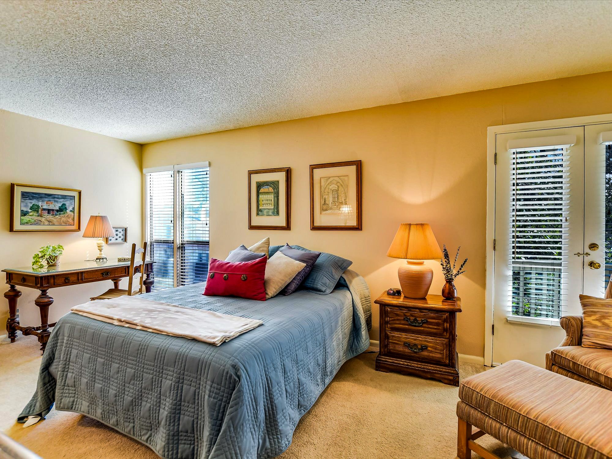 3500 Enfield Road, Unit E Austin, TX 78703 - Photo 14 of 20 a bedroom with two beds and a couch