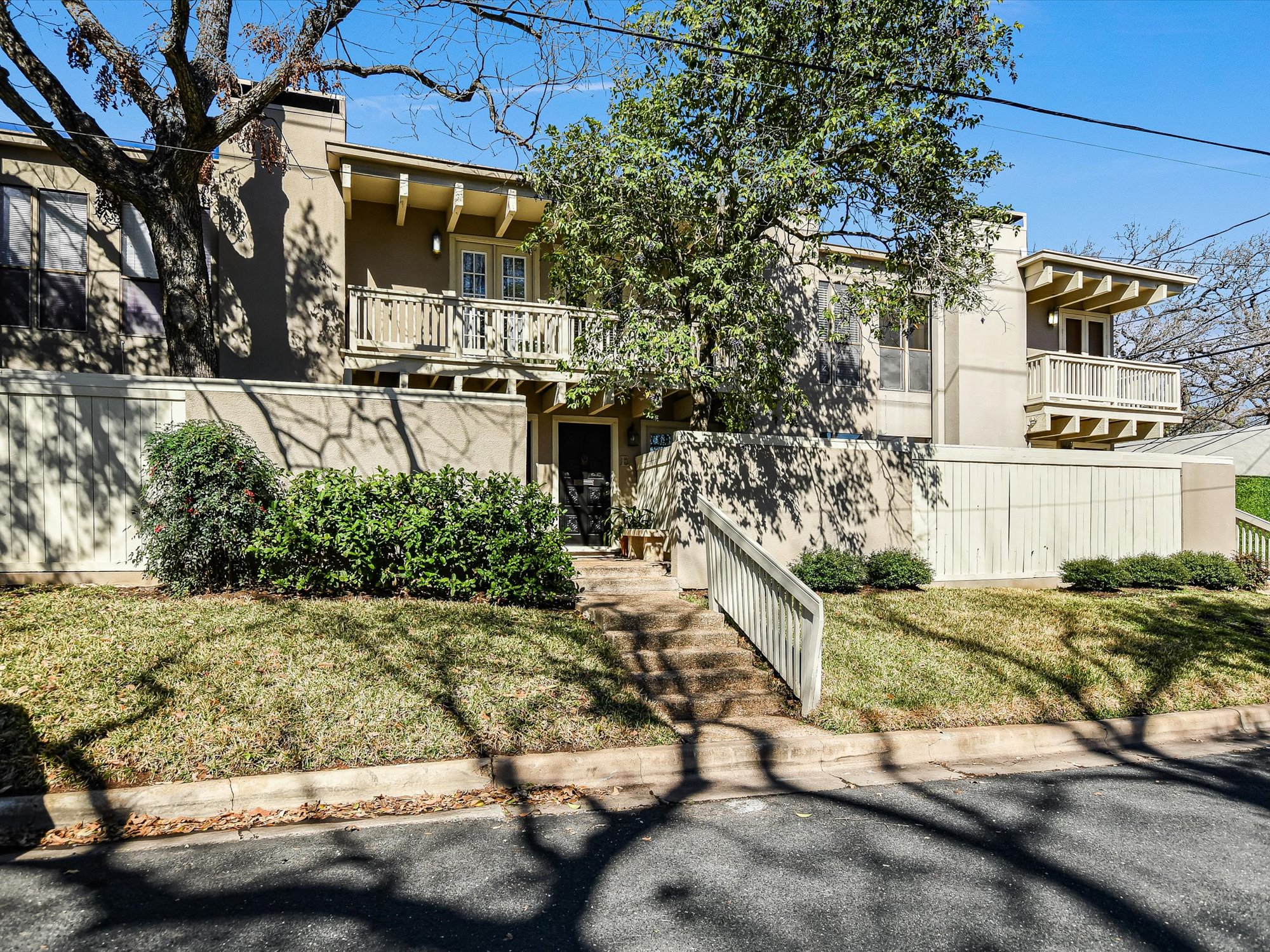 3500 Enfield Road, Unit E Austin, TX 78703 - Photo 2 of 20 a view of a street with houses