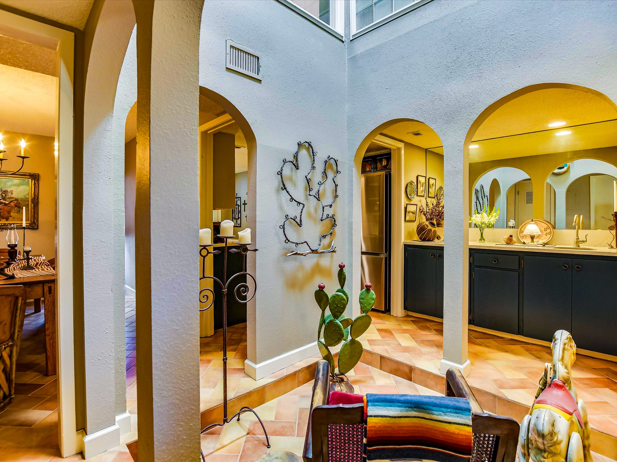 3500 Enfield Road, Unit E Austin, TX 78703 - Photo 4 of 20 a living room with couches a dining table with wooden floor