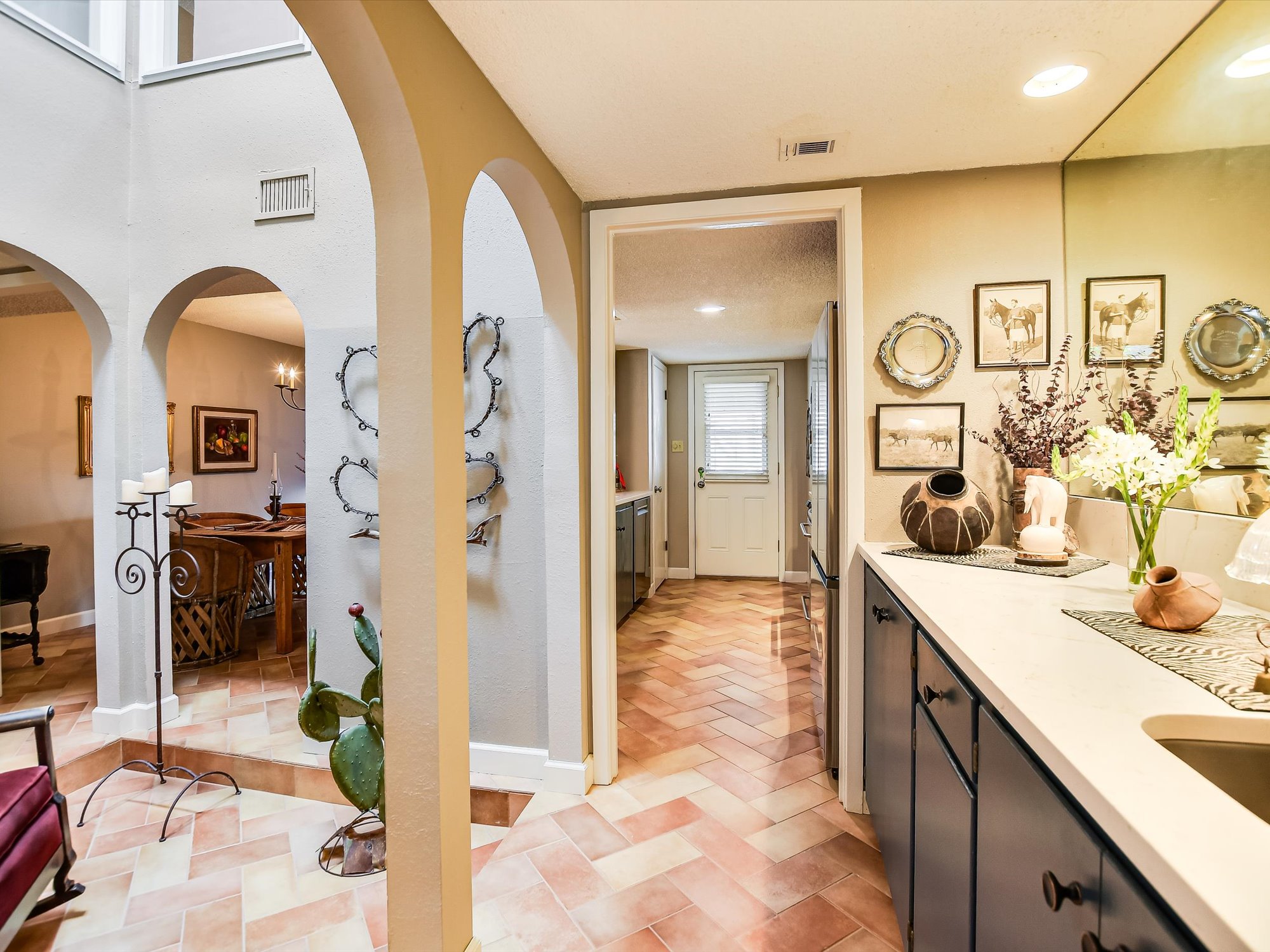 3500 Enfield Road, Unit E Austin, TX 78703 - Photo 5 of 20 a spacious bathroom with a granite countertop sink mirror and shower