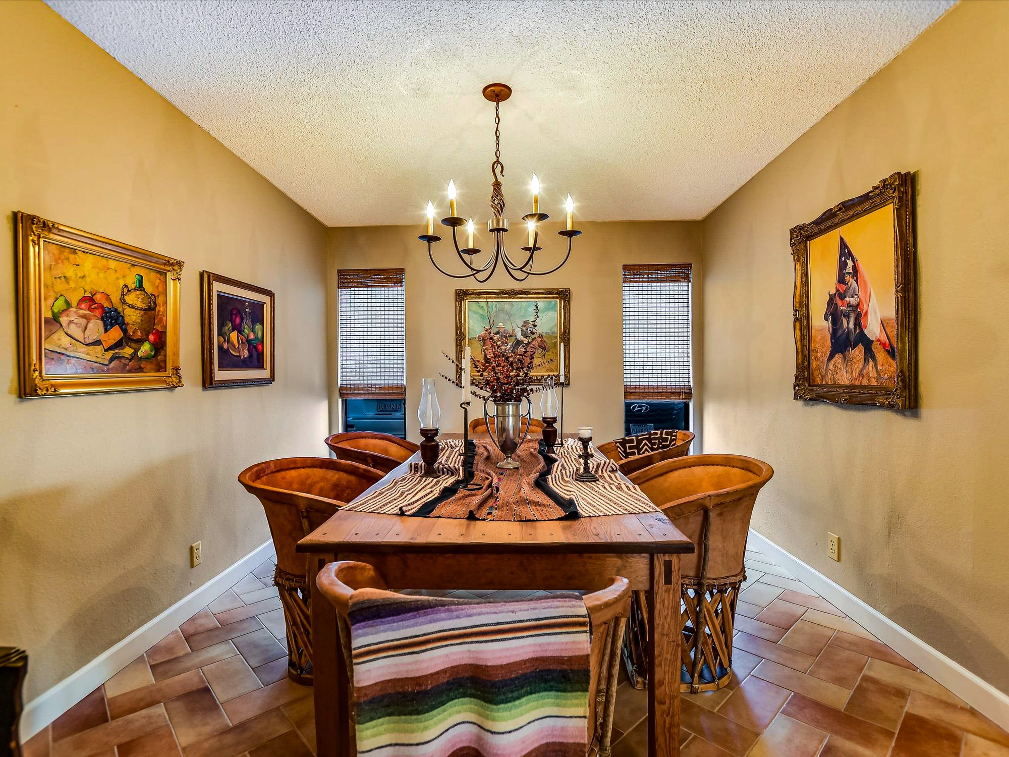 3500 Enfield Road, Unit E Austin, TX 78703 - Photo 8 of 20 a view of a dining room with furniture window and wooden floor