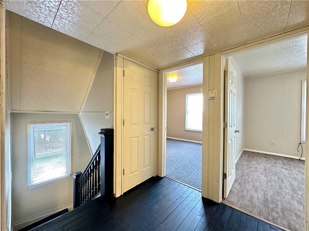 114 South Street Butler, PA 16001 - Photo 18 of 32 a view of a hallway with wooden floor