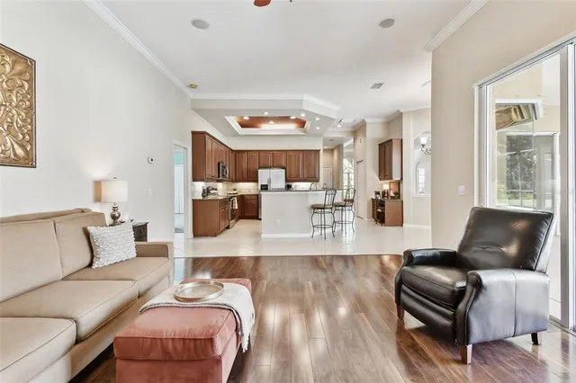 a bathroom with a granite countertop sink a toilet and a mirror