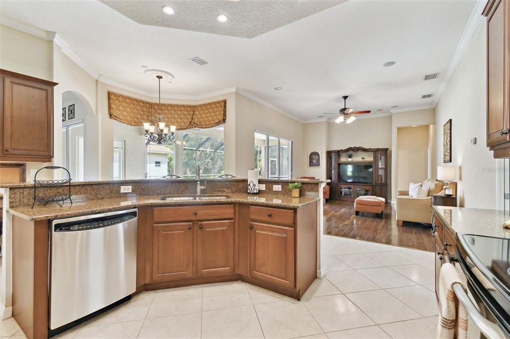 9008 Brookfield Terrace Bradenton, FL 34212 - Photo 23 of 81 a kitchen with lots of counter top space and appliances