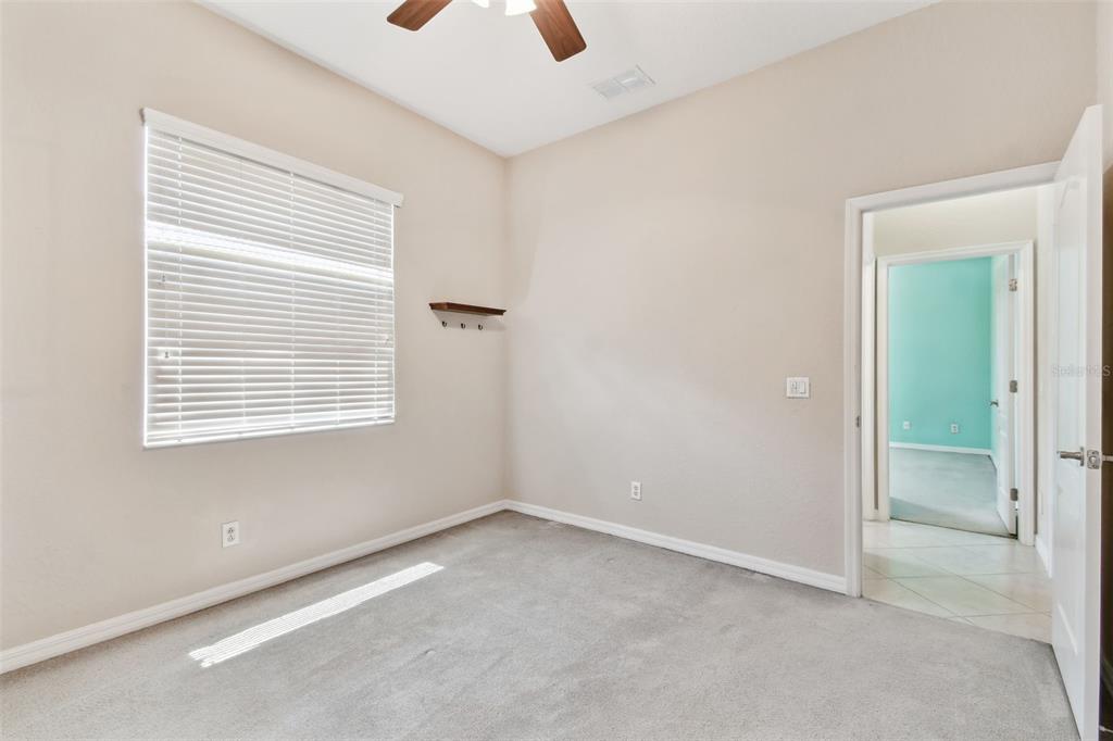 9008 Brookfield Terrace Bradenton, FL 34212 - Photo 32 of 81 a view of an empty room with a window