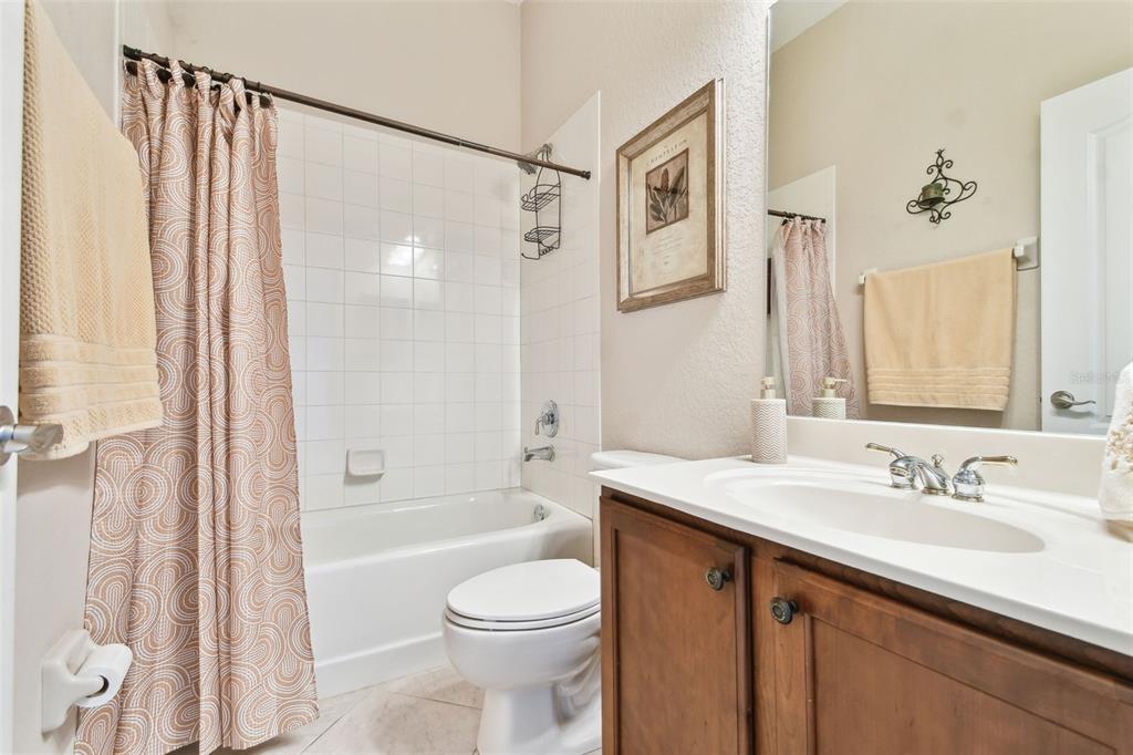 9008 Brookfield Terrace Bradenton, FL 34212 - Photo 48 of 81 a bathroom with a sink a toilet and shower