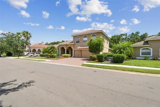 an aerial view of a house with a garden