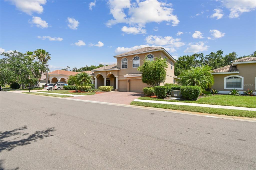 9008 Brookfield Terrace Bradenton, FL 34212 - Photo 49 of 81 a house view with a garden space