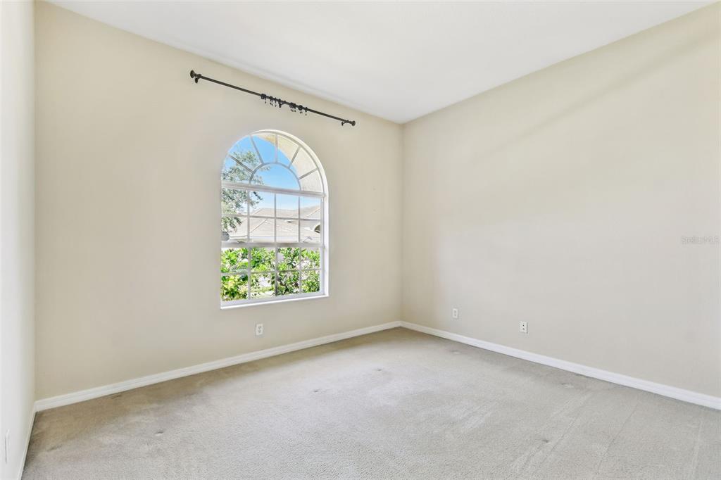 9008 Brookfield Terrace Bradenton, FL 34212 - Photo 56 of 81 an empty room with windows and outdoor view