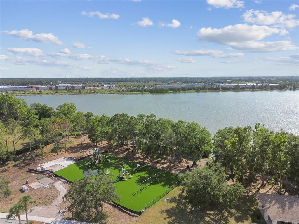 9008 Brookfield Terrace Bradenton, FL 34212 - Photo 62 of 81 a view of a lake from a yard