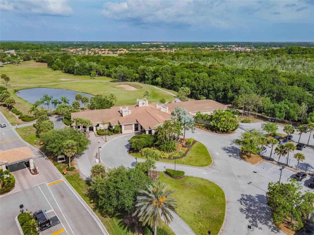9008 Brookfield Terrace Bradenton, FL 34212 - Photo 73 of 81 an aerial view of a residential houses with outdoor space and a lake view
