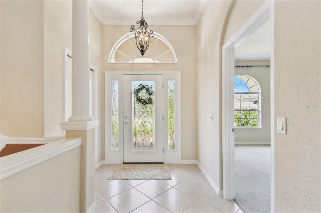 9008 Brookfield Terrace Bradenton, FL 34212 - Photo 8 of 81 a view of entryway with wooden floor