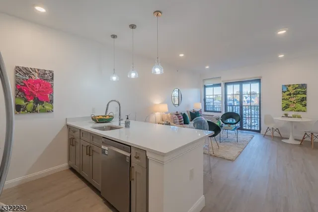 a view of a living room and dining room