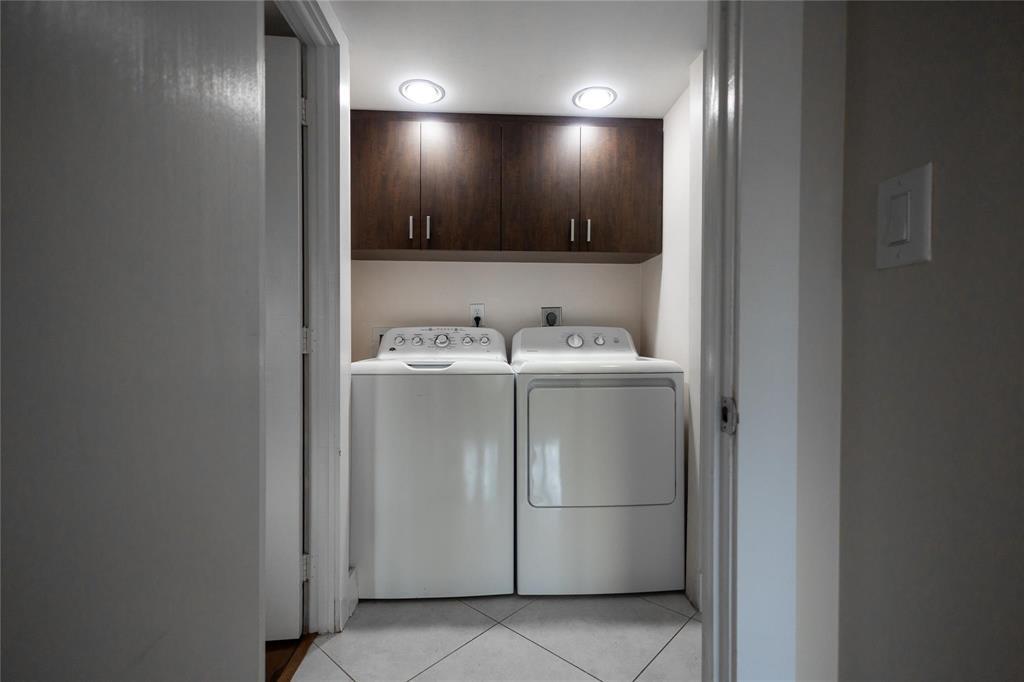 4152 Inverrary Drive, Unit 202 Lauderhill, FL 33319 - Photo 11 of 13 a utility room with dryer and washer
