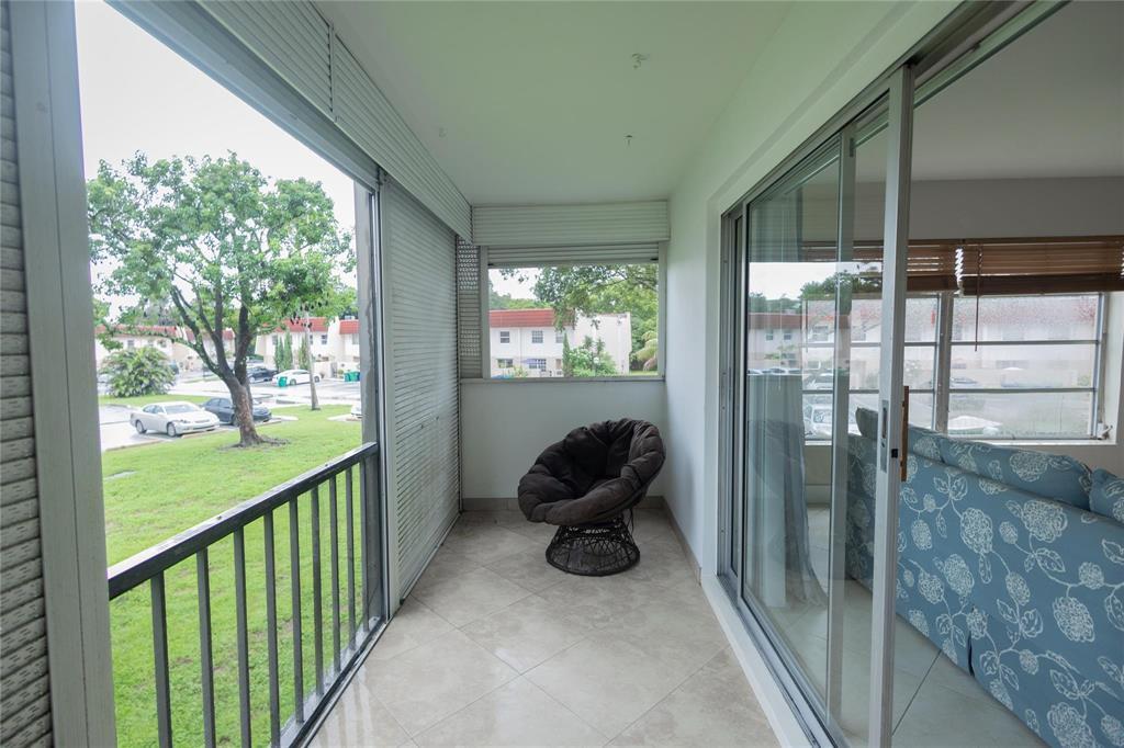 4152 Inverrary Drive, Unit 202 Lauderhill, FL 33319 - Photo 7 of 13 a view of a room and a large window