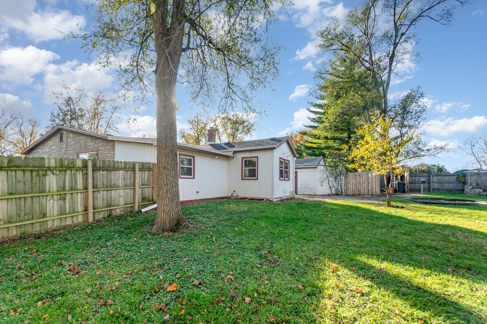 2936 Willow Road Homewood, IL 60430 - Photo 21 of 26 a view of a house with a yard and large trees