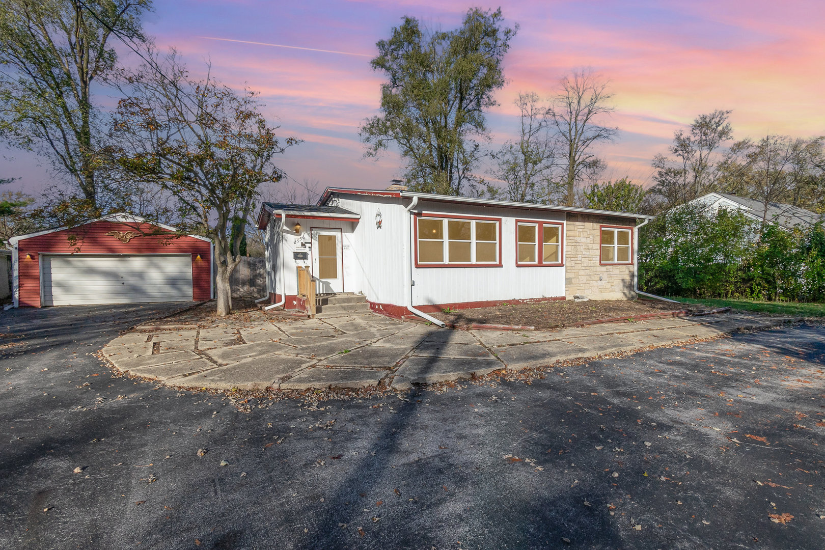 2936 Willow Road Homewood, IL 60430 - Photo 26 of 26 a view of a house with a backyard and a tree