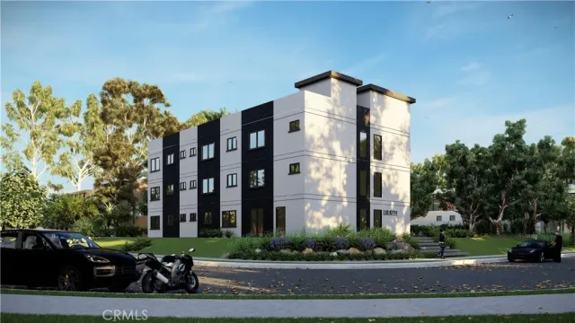 a city street lined with buildings and trees