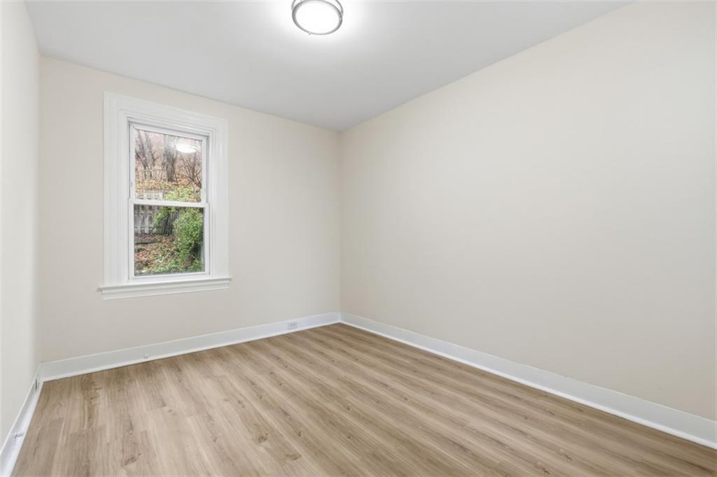 13 Marchmont Street Pittsburgh, PA 15205 - Photo 27 of 29 an empty room with a window