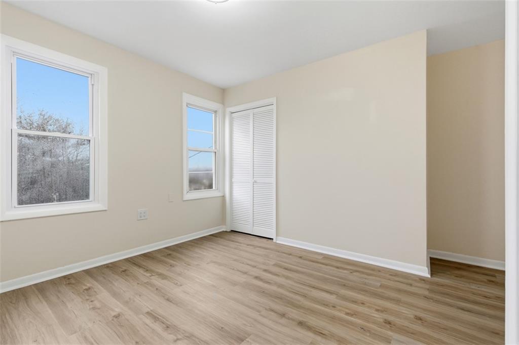 13 Marchmont Street Pittsburgh, PA 15205 - Photo 5 of 29 a view of an empty room with wooden floor and a window