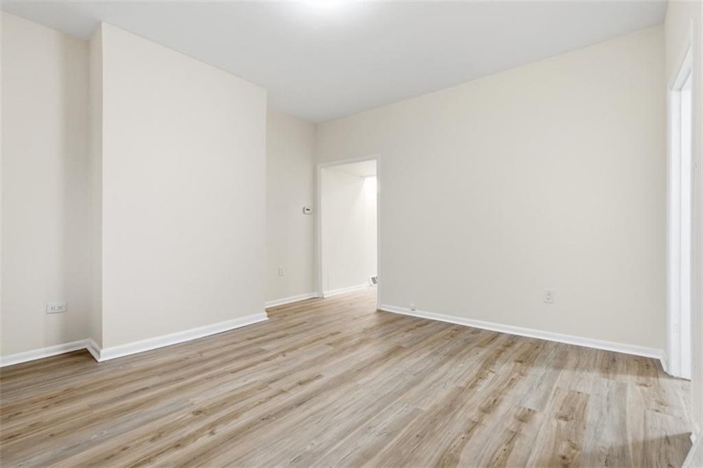 13 Marchmont Street Pittsburgh, PA 15205 - Photo 6 of 29 a view of an empty room with wooden floor