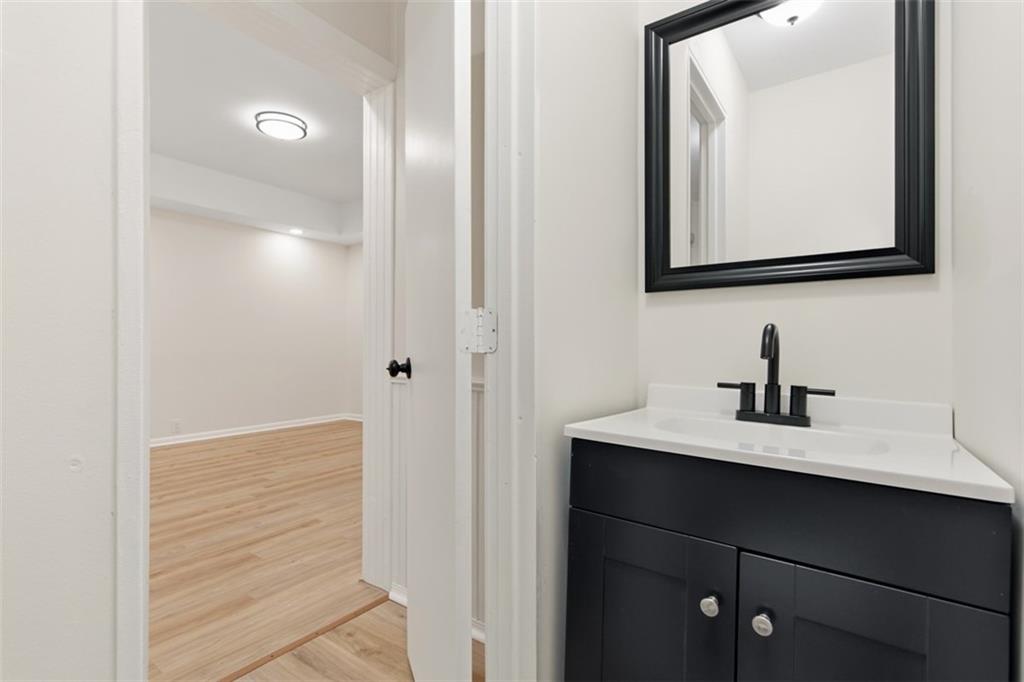 13 Marchmont Street Pittsburgh, PA 15205 - Photo 7 of 29 a bathroom with a sink vanity and a mirror